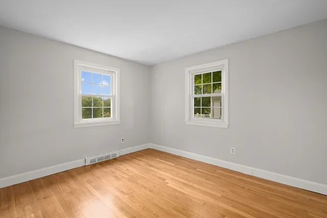 a view of a room with windows