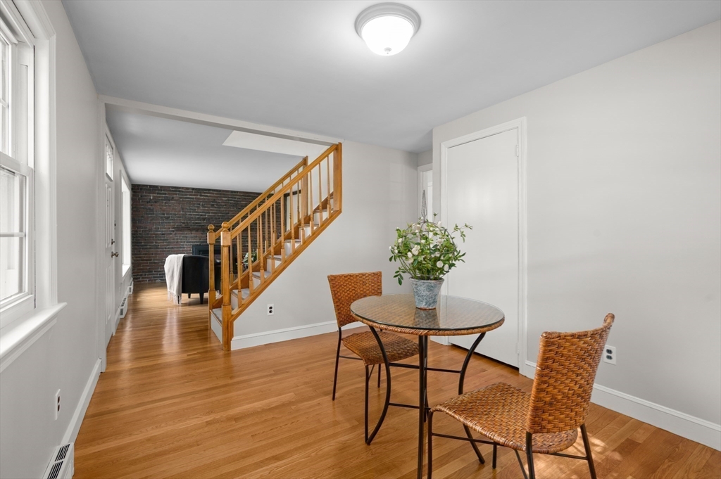 39 Wadsworth Street Danvers, MA 01923 - Photo 16 of 35 a dining room with furniture and wooden floor