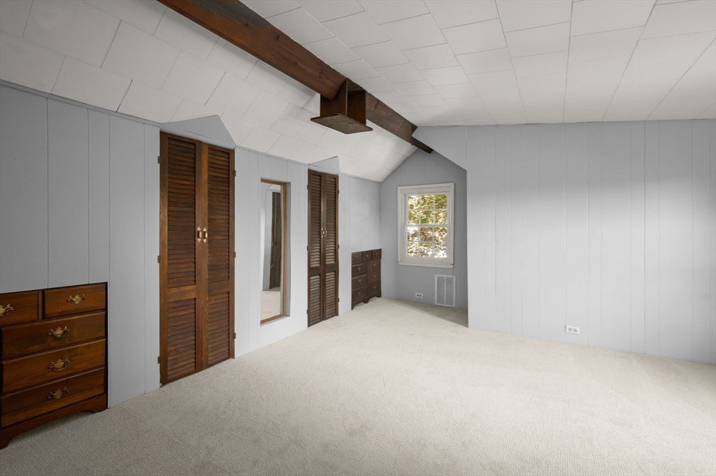 39 Wadsworth Street Danvers, MA 01923 - Photo 22 of 35 an empty room with closet and windows