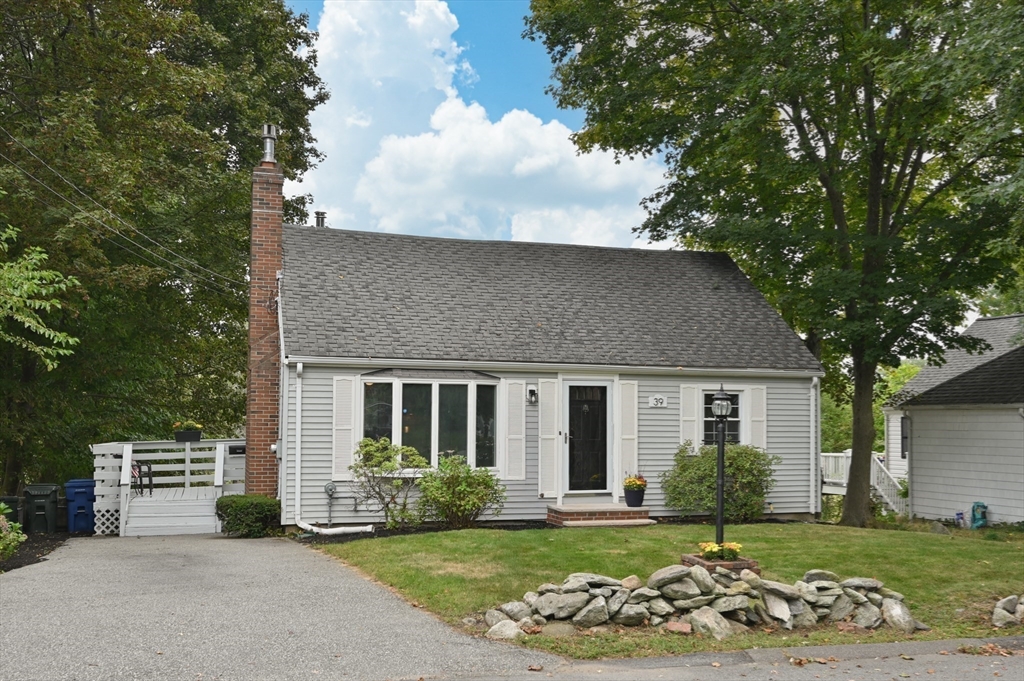 39 Wadsworth Street Danvers, MA 01923 - Photo 28 of 35 a view of a house with a yard and sitting area