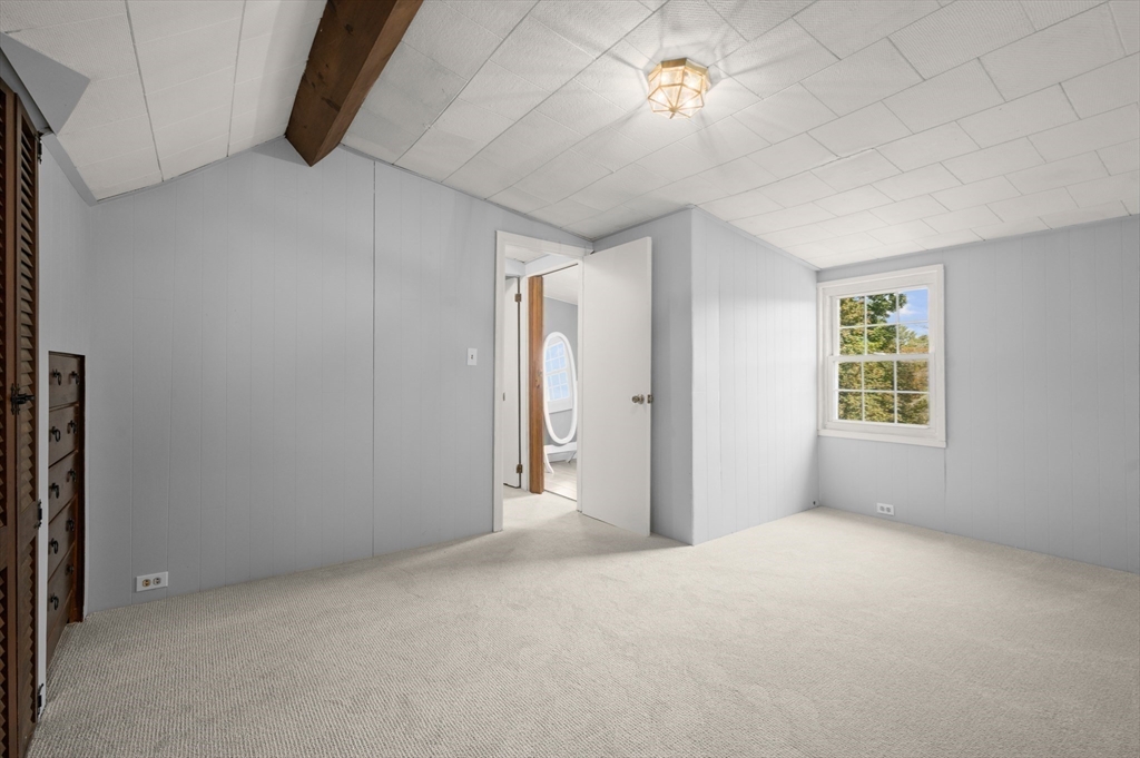 39 Wadsworth Street Danvers, MA 01923 - Photo 29 of 35 a view of a big room with windows and chandelier fan