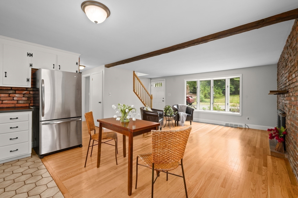 39 Wadsworth Street Danvers, MA 01923 - Photo 10 of 35 a view of a kitchen with furniture and a window