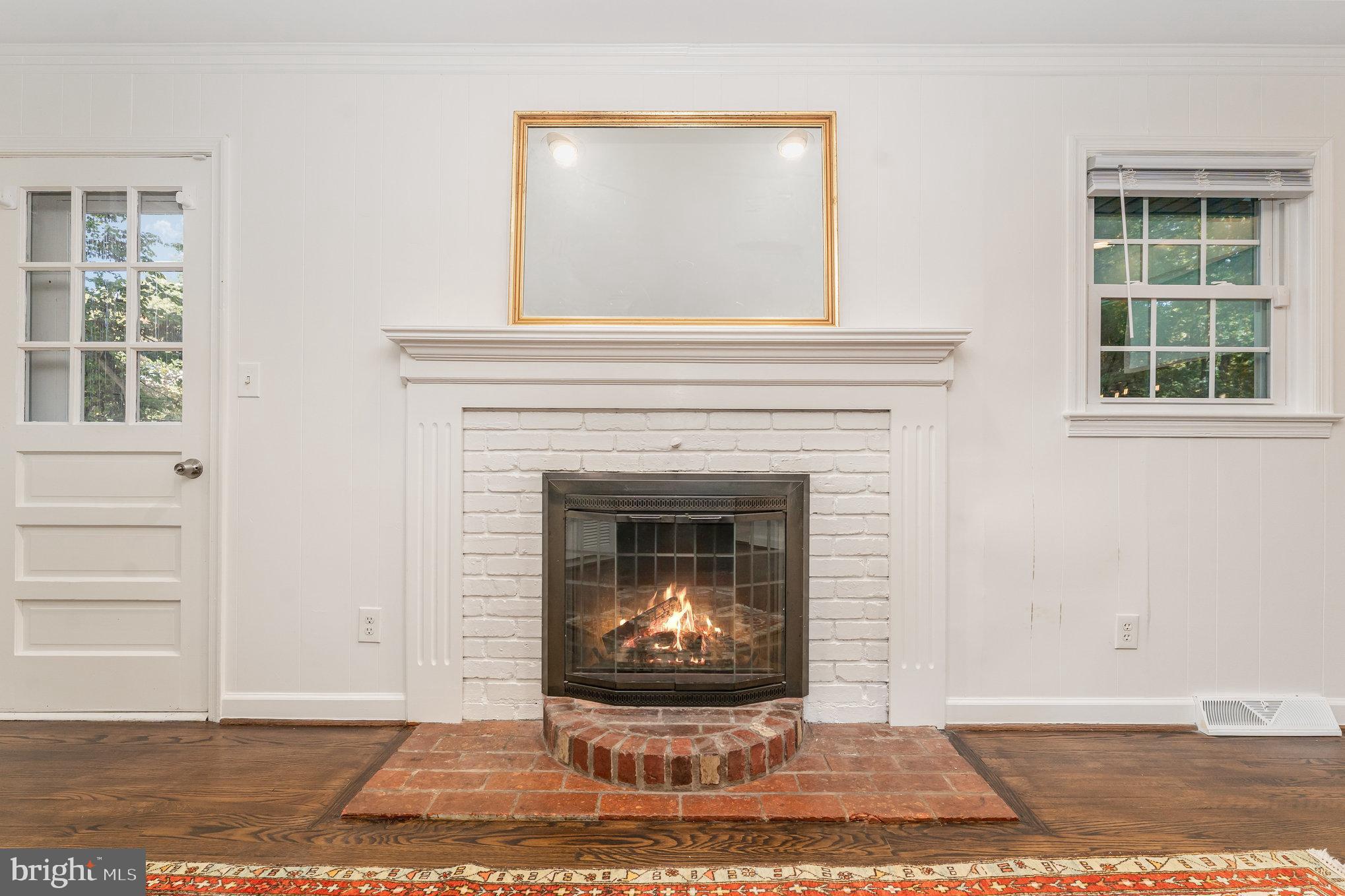 112 Jay Road Fredericksburg, VA 22405 - Photo 14 of 44 a living room with a fireplace and a window