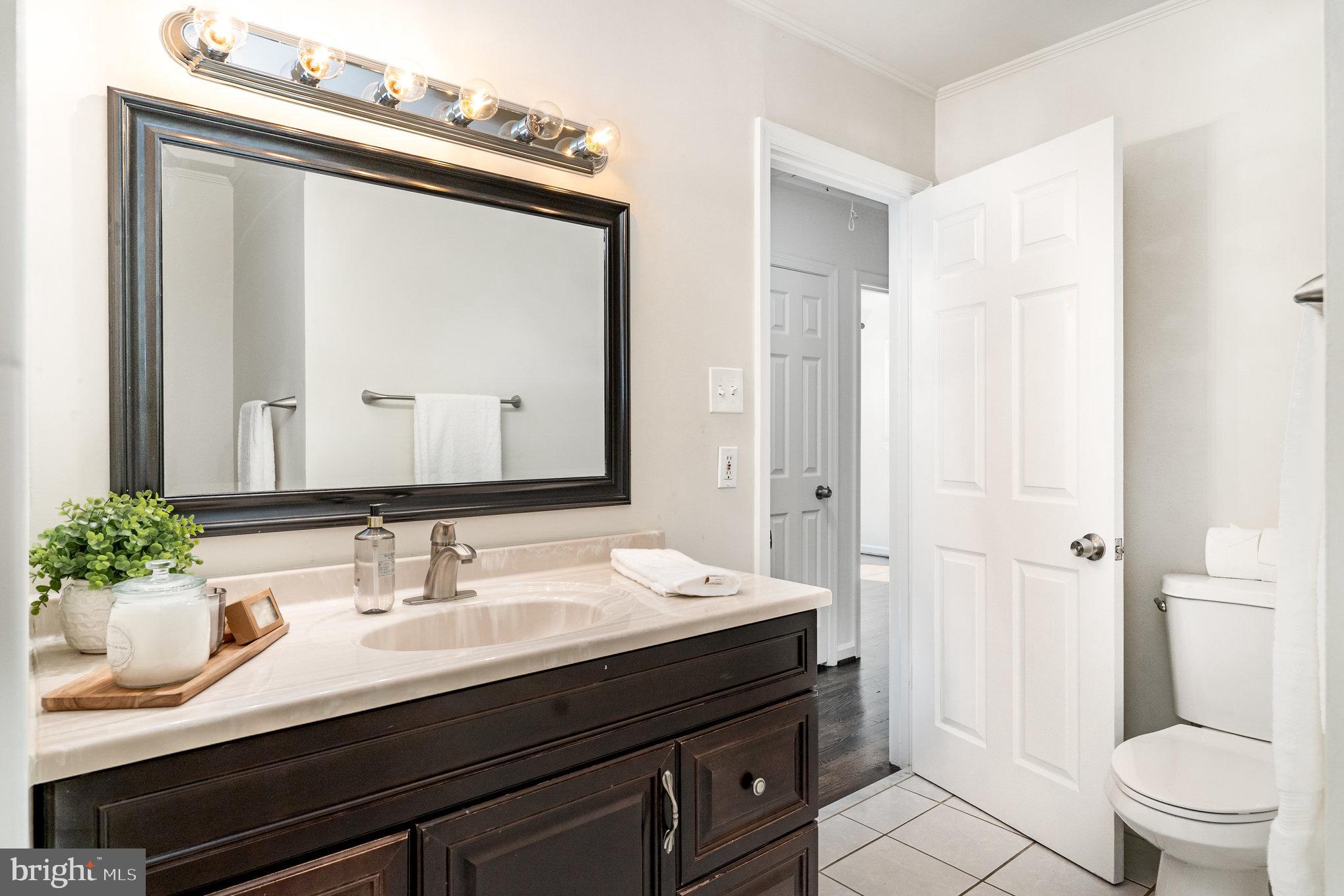 112 Jay Road Fredericksburg, VA 22405 - Photo 32 of 44 a bathroom with a sink a toilet and shower
