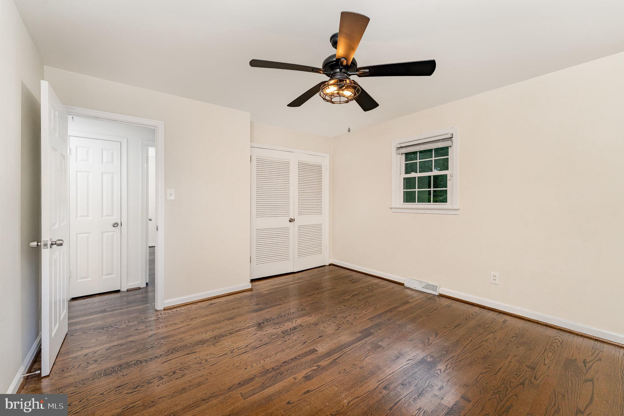 112 Jay Road Fredericksburg, VA 22405 - Photo 37 of 44 a view of empty room with wooden floor and window