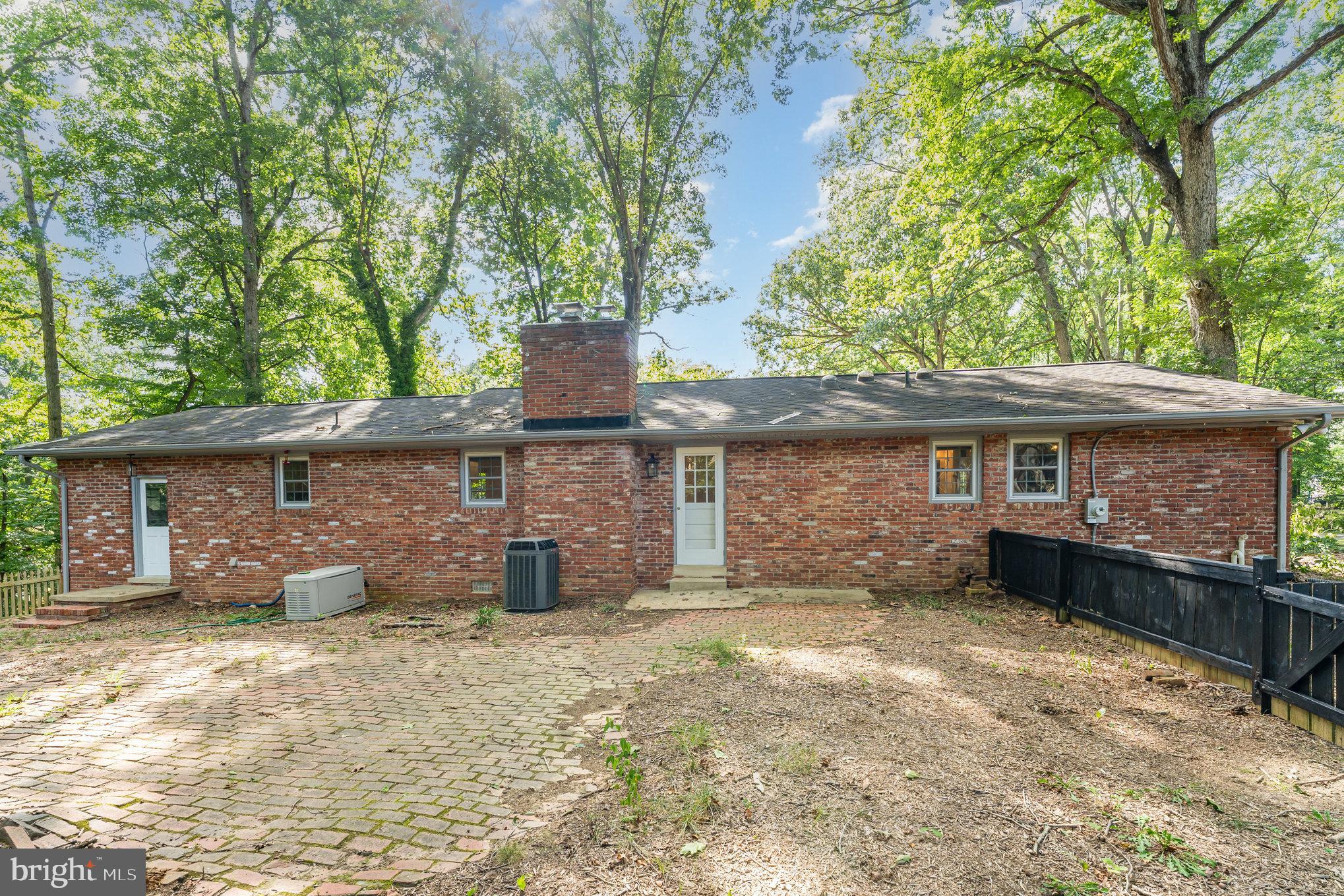 112 Jay Road Fredericksburg, VA 22405 - Photo 39 of 44 a front view of a house with a garden