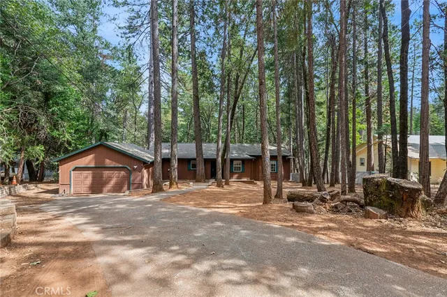 a house with trees in front of it