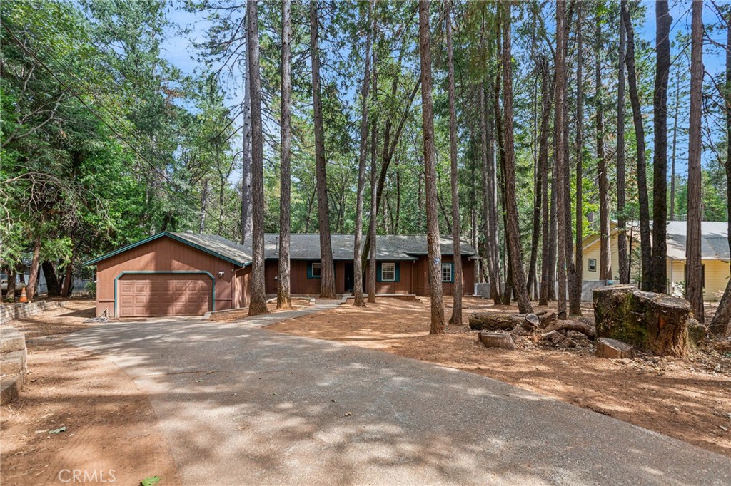 a house with trees in front of it