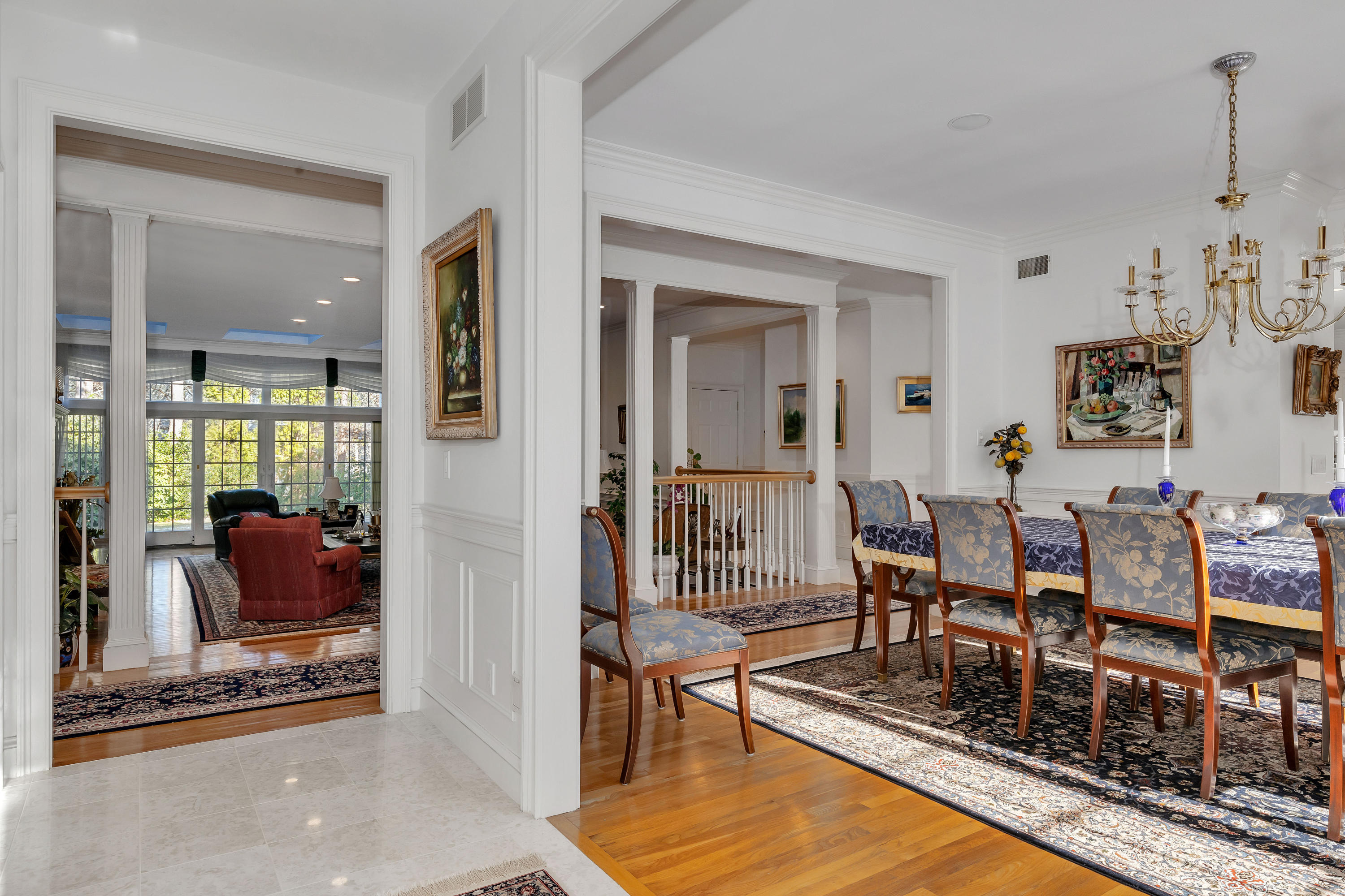 50 Nons Road Harwich Port, MA 02646 - Photo 7 of 83 a living room with furniture a rug and a chandelier