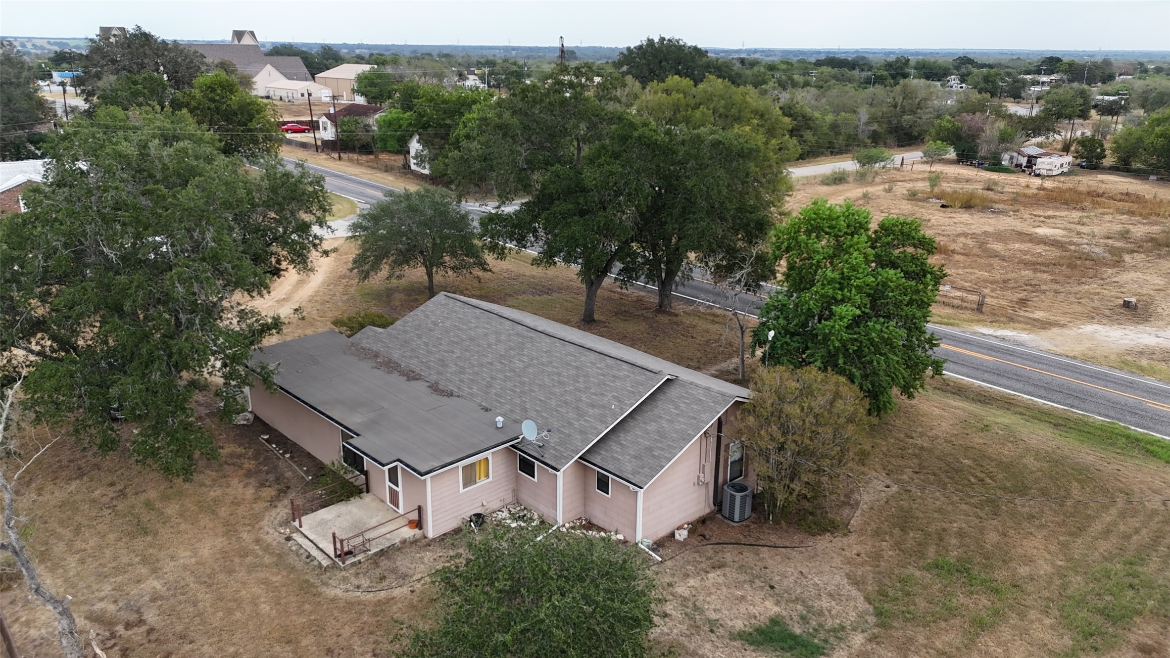 307 5th Street Sutherland Springs, TX 78161 - Photo 4 of 16 an aerial view of a house with a yard basket ball court and outdoor seating