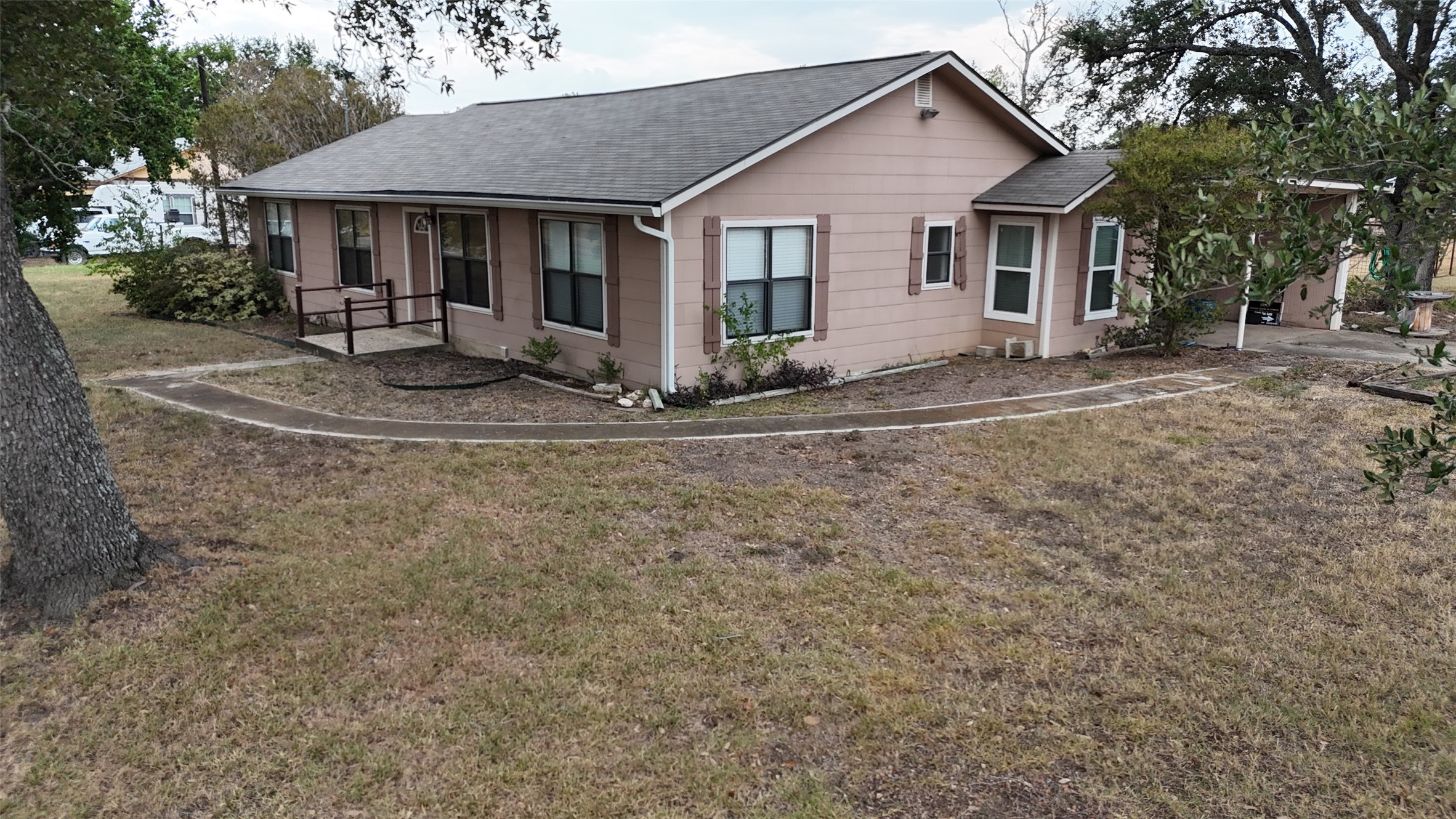 307 5th Street Sutherland Springs, TX 78161 - Photo 5 of 16 a view of a house with a yard