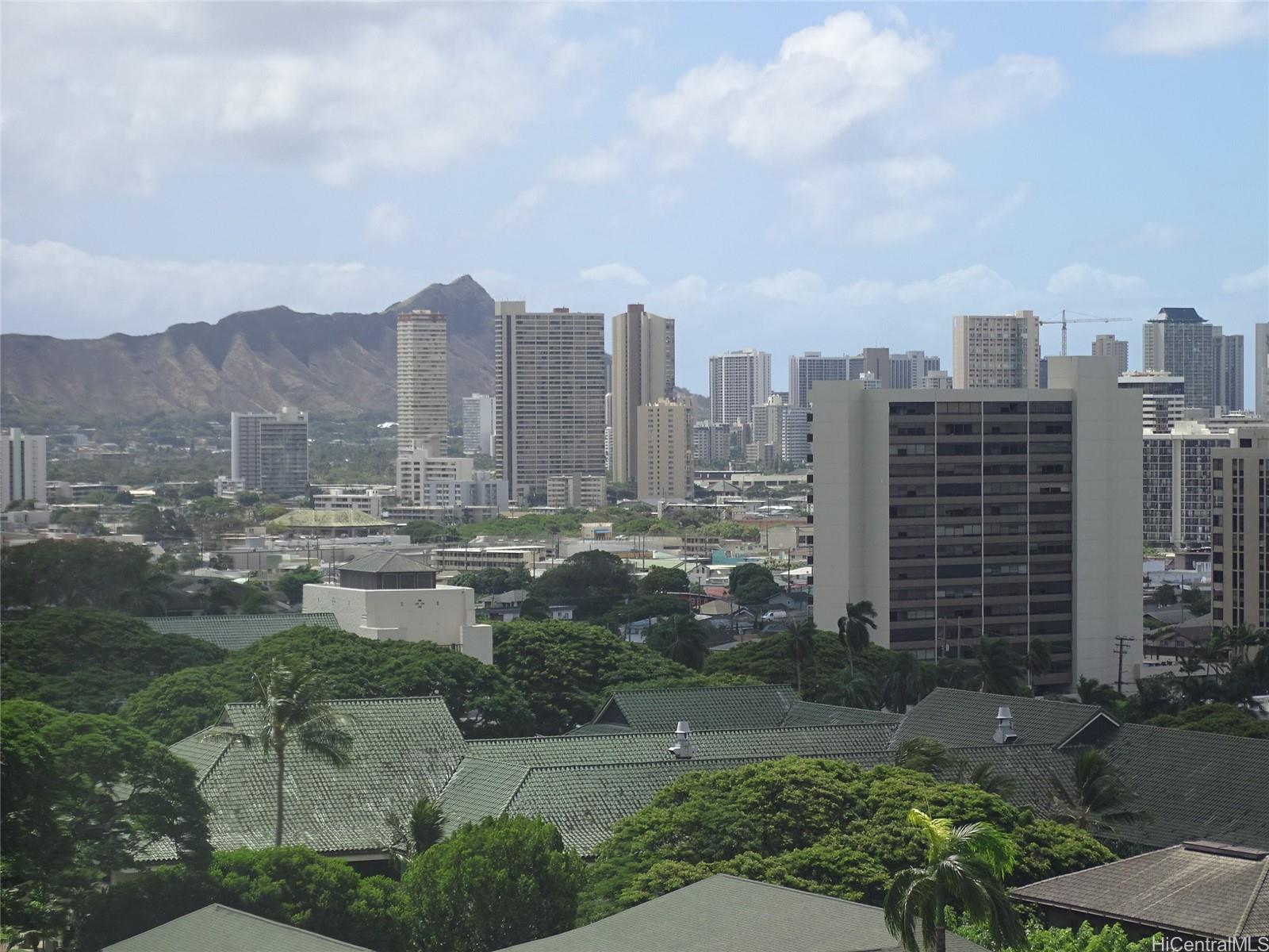 a view of a city with tall buildings