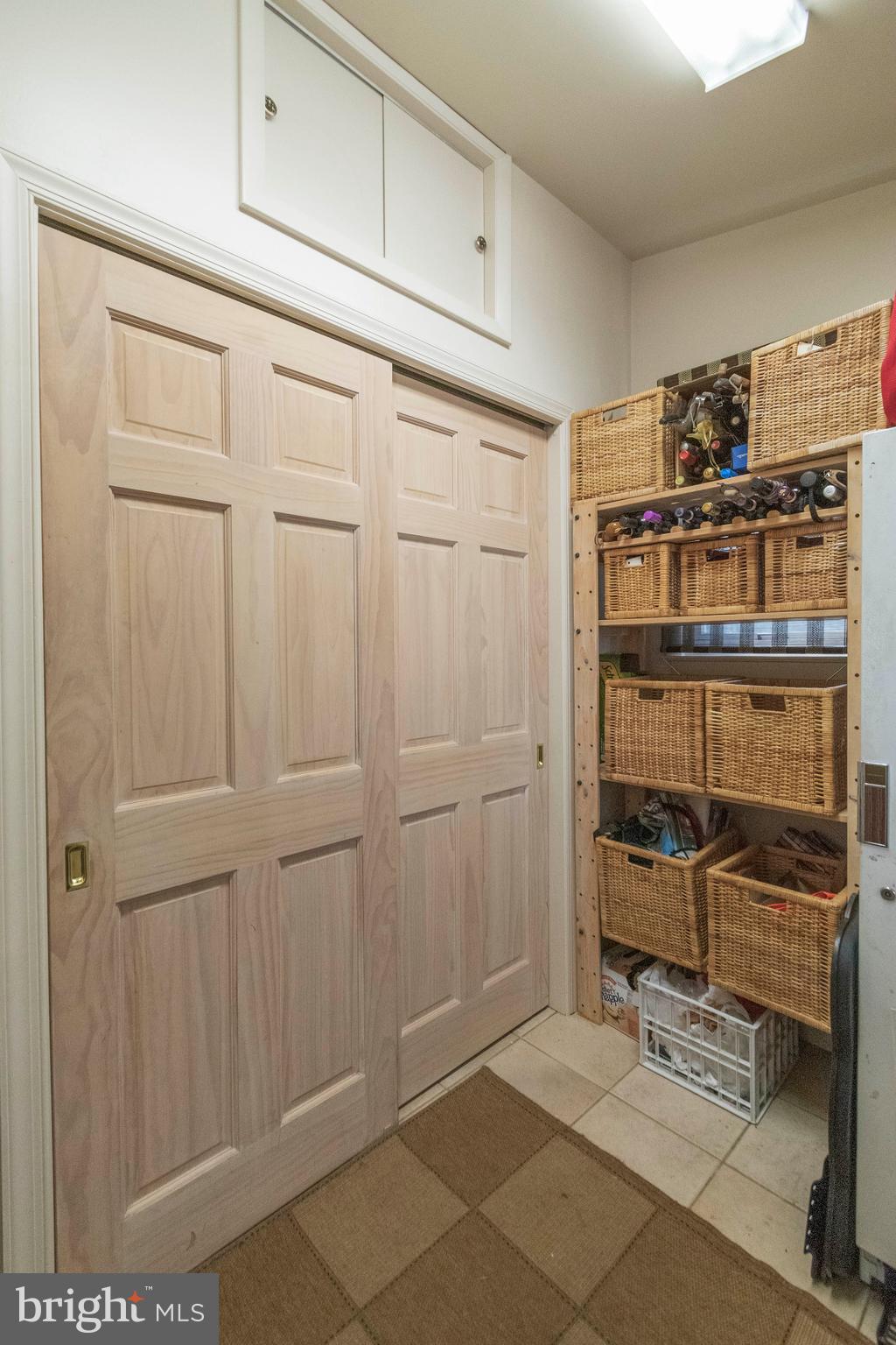 540 Putnam Road Merion Station, PA 19066 - Photo 17 of 32 a view of a storage & utility room with racks on the wall