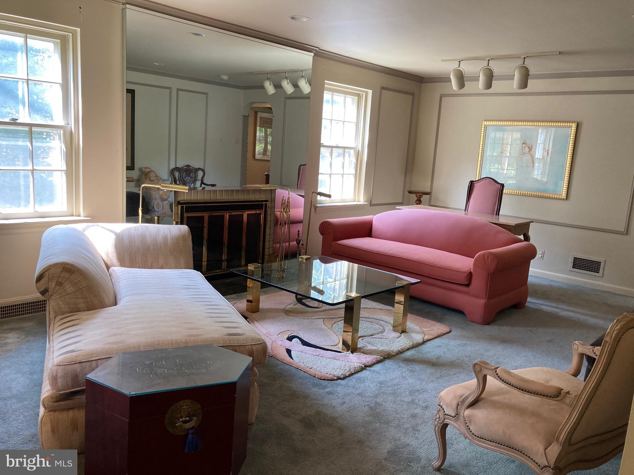 540 Putnam Road Merion Station, PA 19066 - Photo 18 of 32 a living room with furniture and a large window