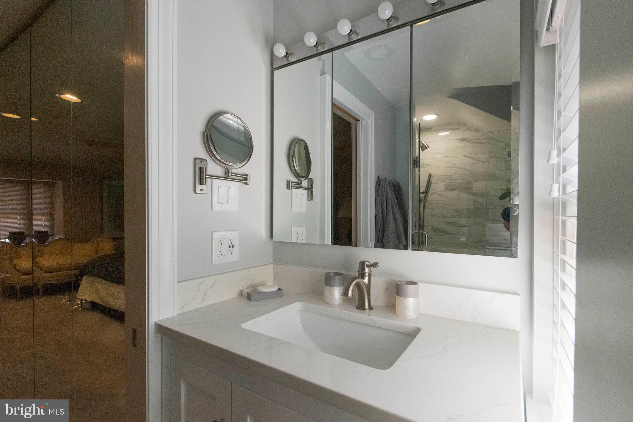 540 Putnam Road Merion Station, PA 19066 - Photo 26 of 32 a bathroom with a sink a toilet and shower