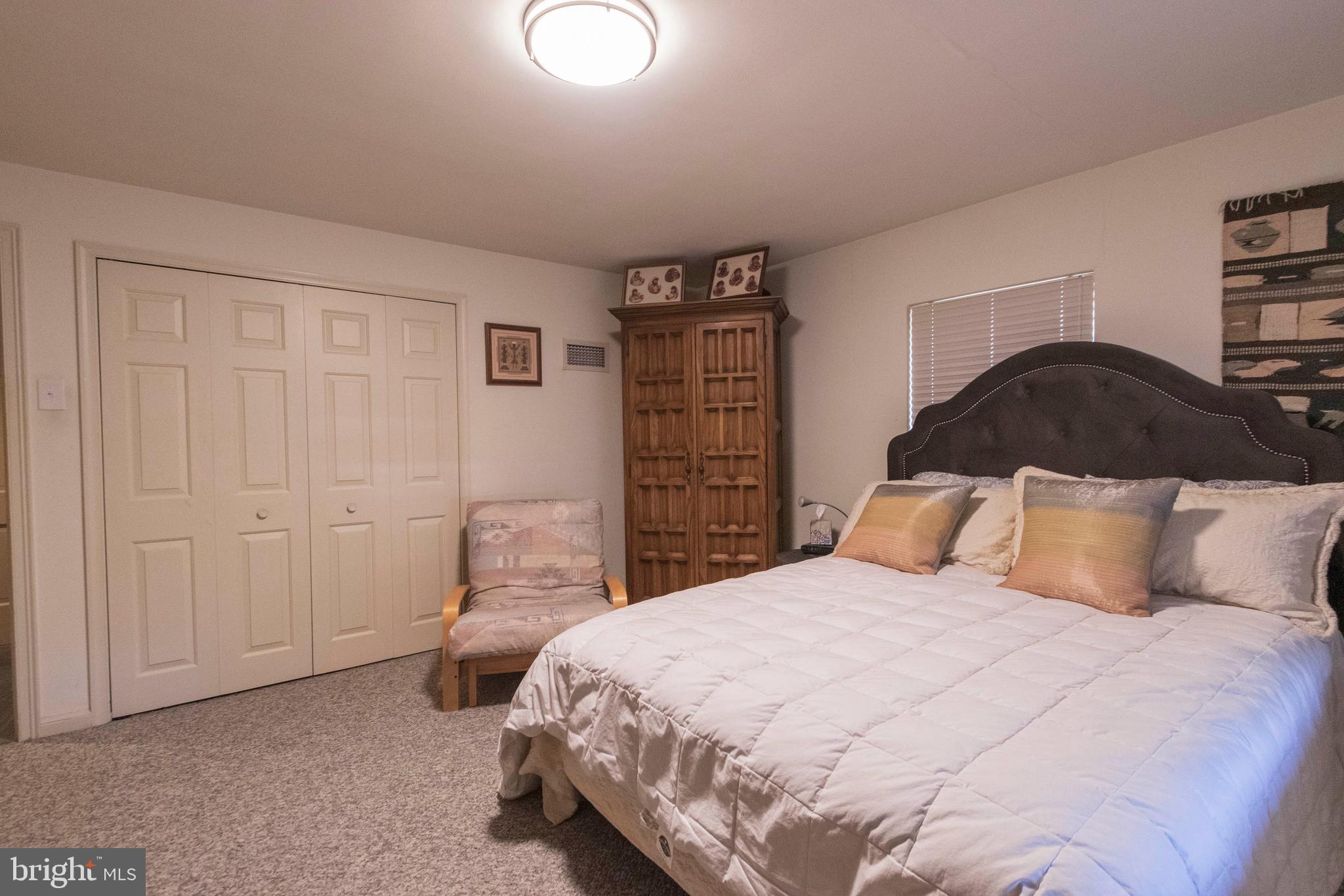 540 Putnam Road Merion Station, PA 19066 - Photo 29 of 32 a bedroom with a bed and a closet