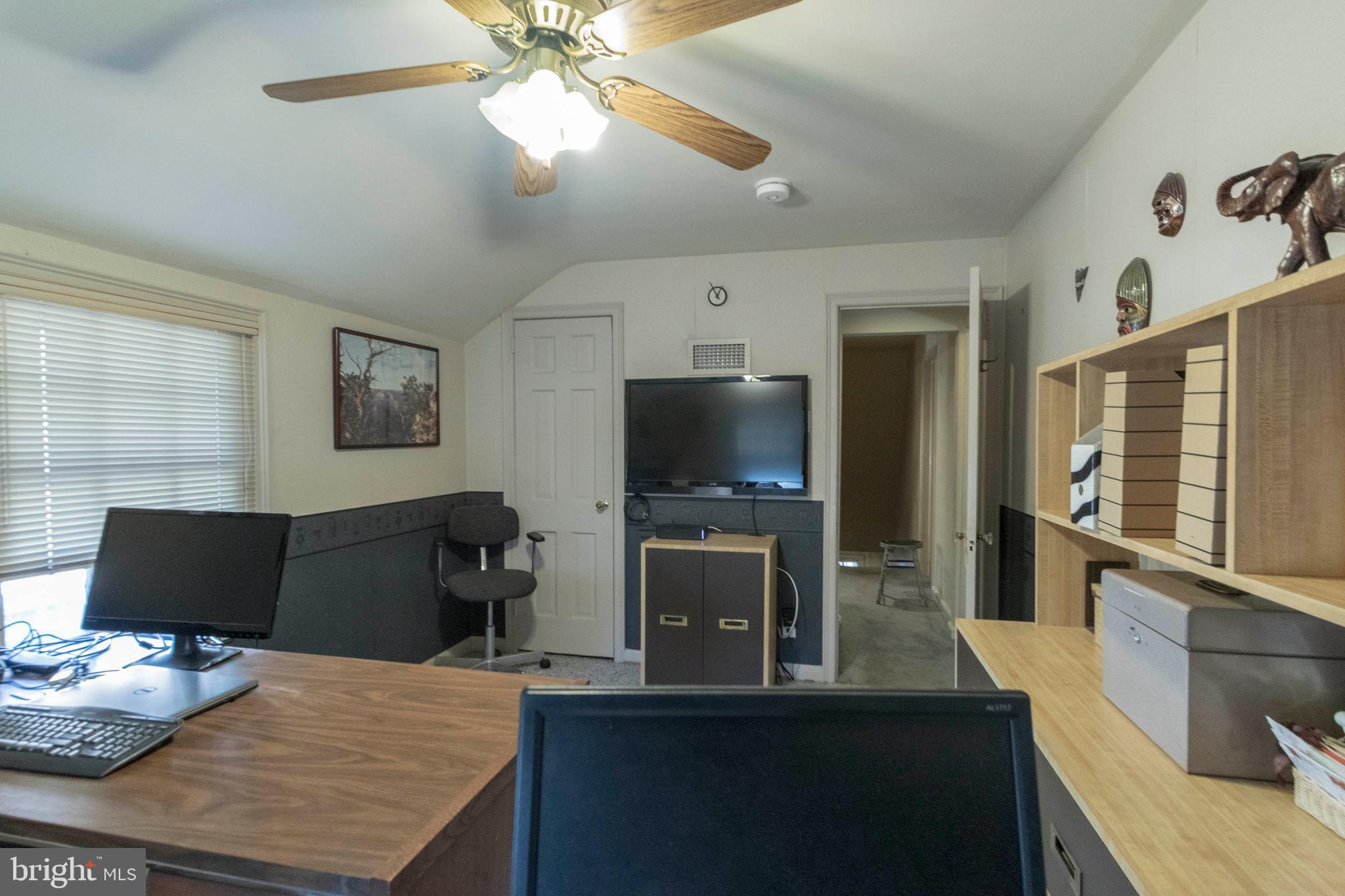 540 Putnam Road Merion Station, PA 19066 - Photo 30 of 32 a living room with furniture and a flat screen tv