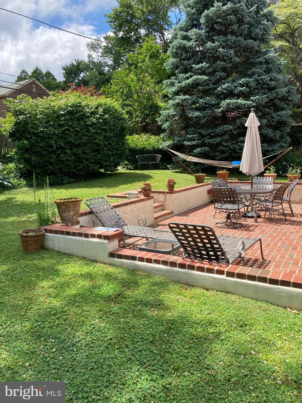 540 Putnam Road Merion Station, PA 19066 - Photo 5 of 32 a view of a backyard with swimming pool