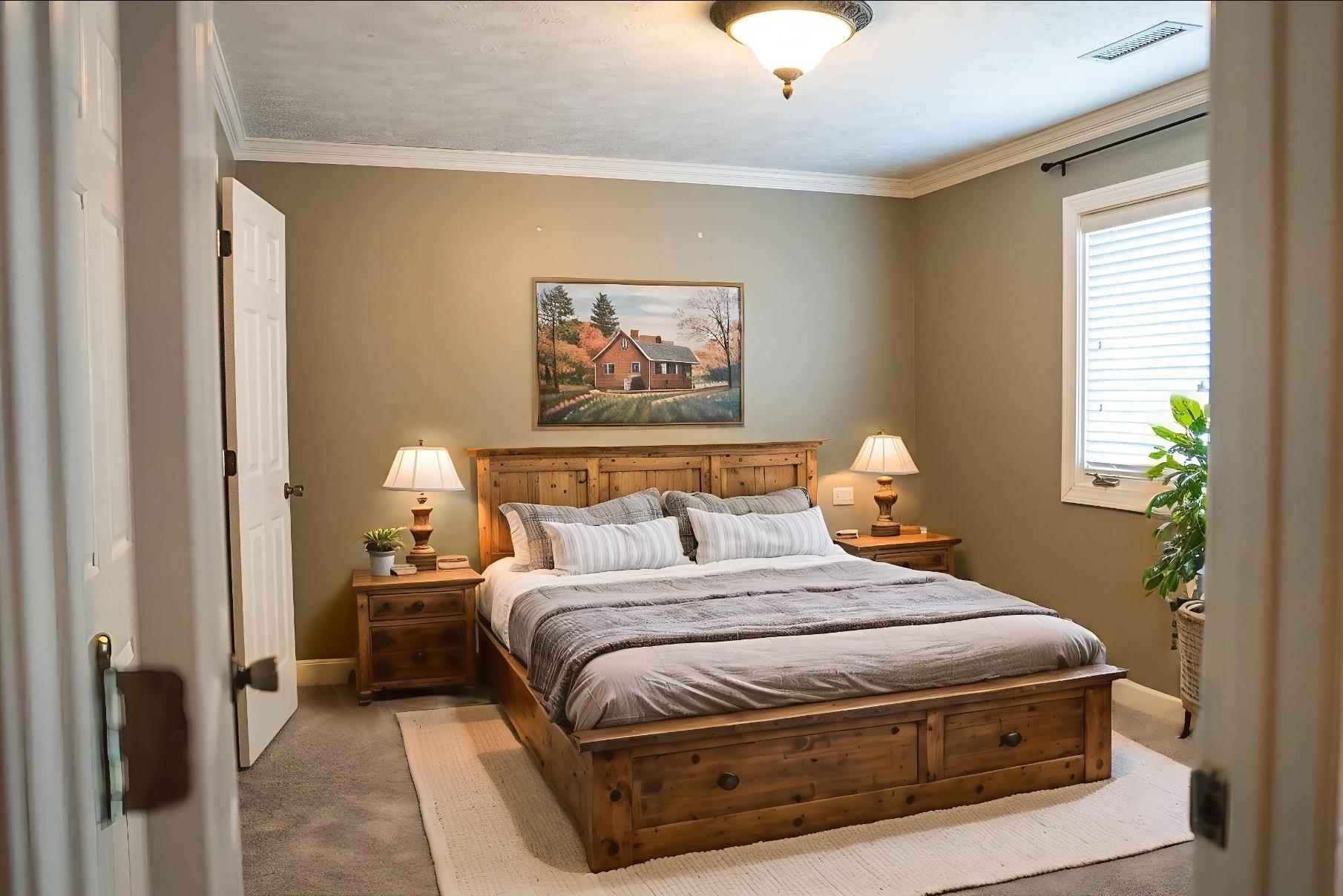 103 April Cove Ripley, TN 38063 - Photo 11 of 22 a bedroom with a bed and a painting on the wall