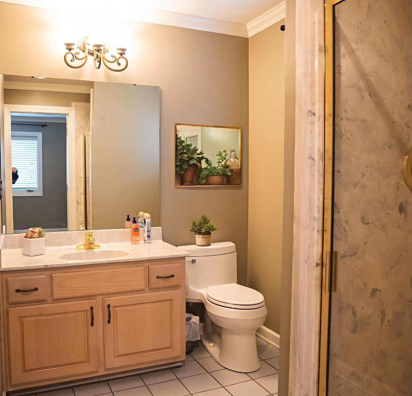 103 April Cove Ripley, TN 38063 - Photo 13 of 22 a spacious bathroom with a toilet sink and mirror