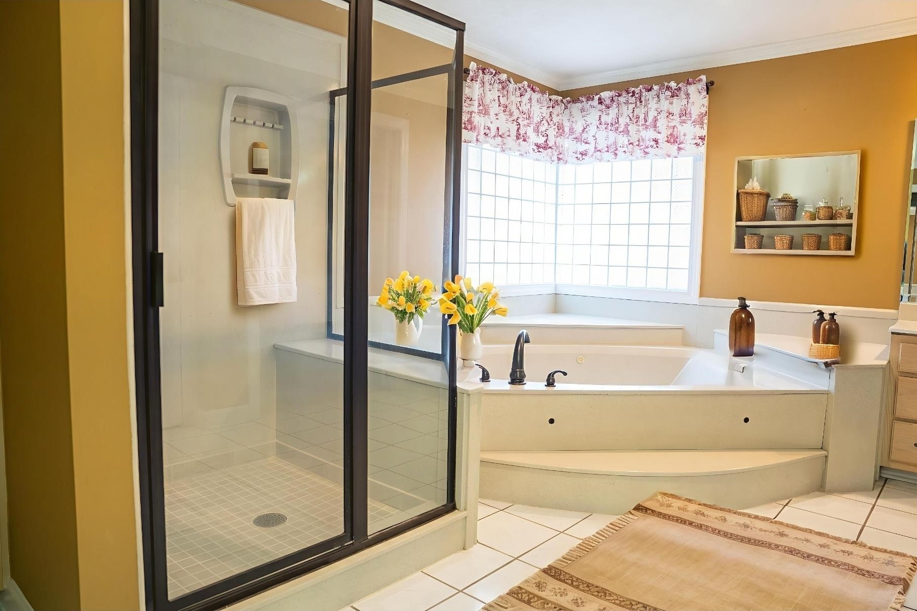 103 April Cove Ripley, TN 38063 - Photo 15 of 22 a bathroom with a bathtub and a shower
