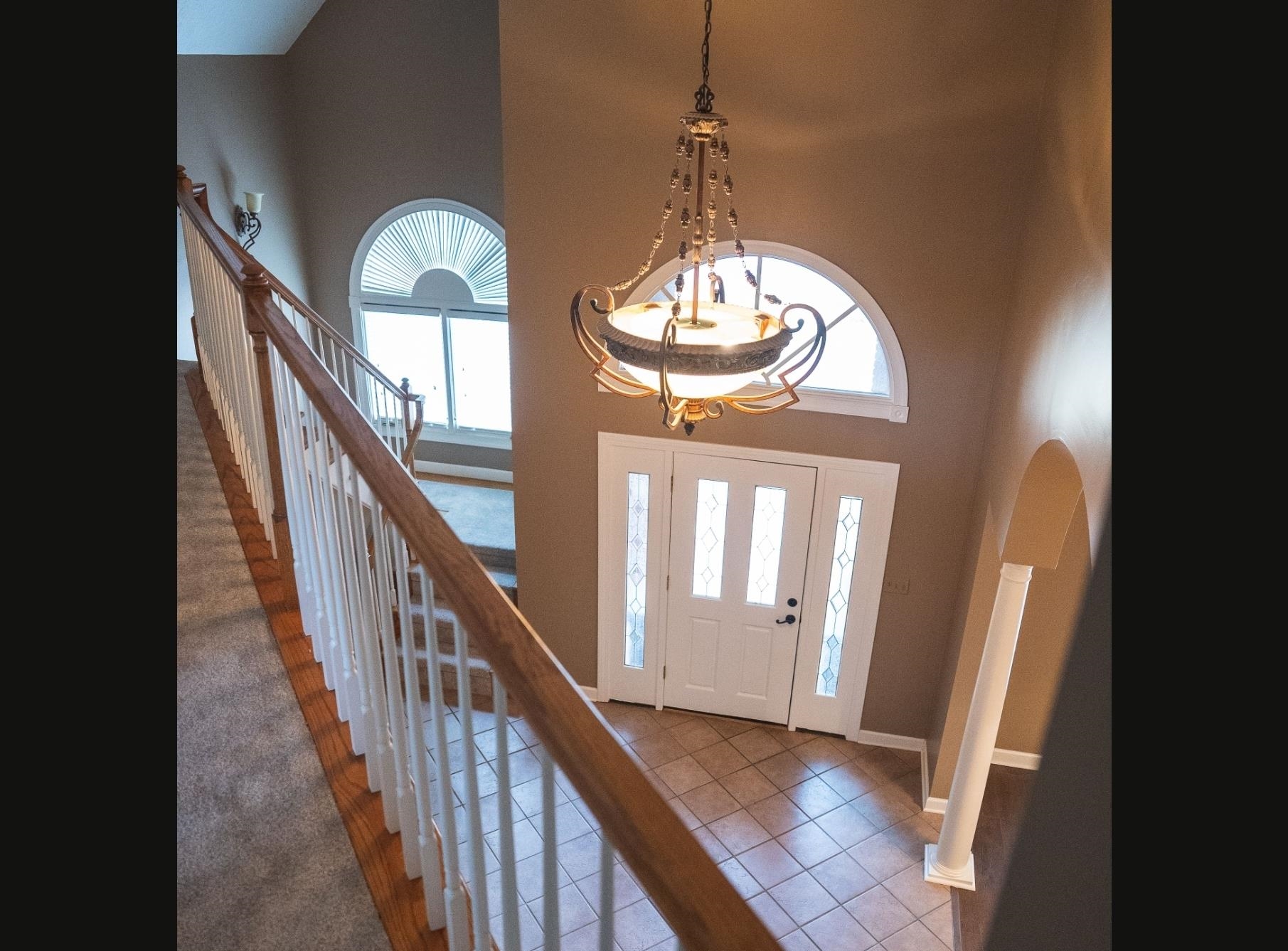 103 April Cove Ripley, TN 38063 - Photo 3 of 22 a view of a livingroom with wooden floor and stairs