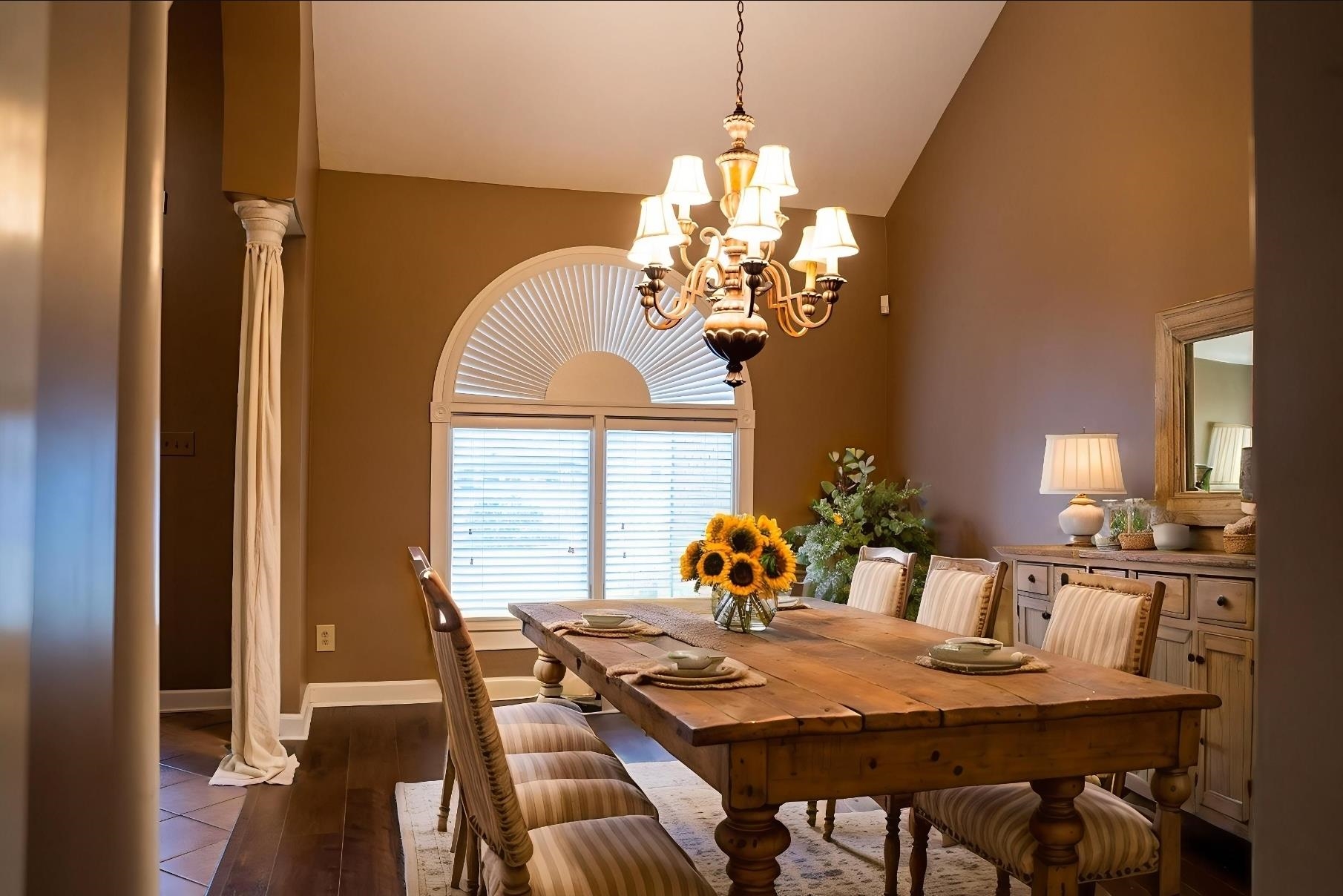 103 April Cove Ripley, TN 38063 - Photo 4 of 22 a view of a dining room with furniture wooden floor and chandelier