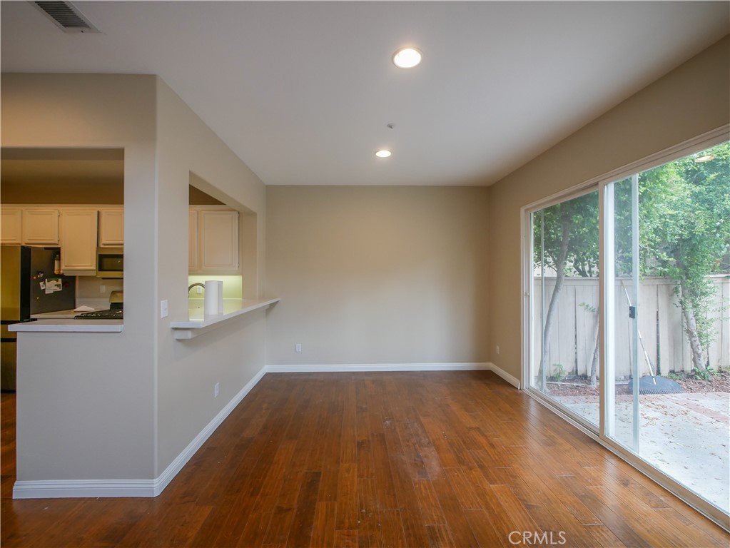 67 Ardmore Irvine, CA 92602 - Photo 6 of 16 wooden floor in an empty room with a window