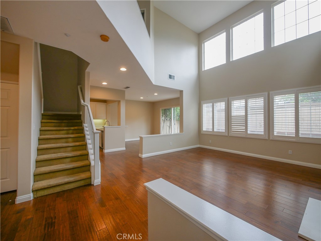 67 Ardmore Irvine, CA 92602 - Photo 8 of 16 wooden floor in an empty room with a window