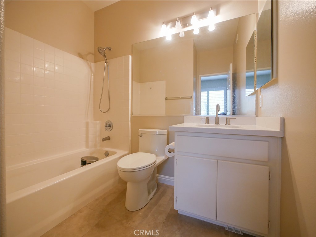 67 Ardmore Irvine, CA 92602 - Photo 10 of 16 a bathroom with a sink a toilet and shower