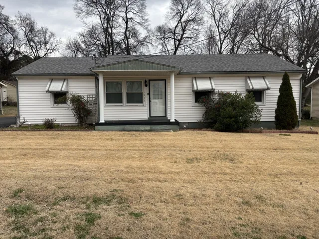 a house view with a garden space