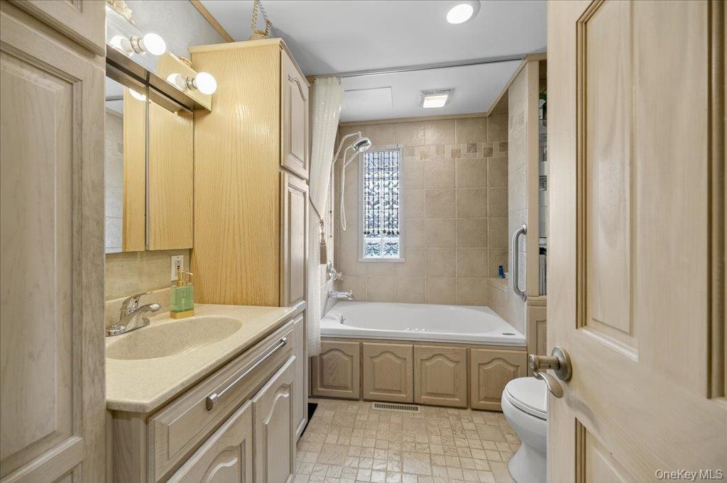 11 Merriewold Lane North Monroe, NY 10950 - Photo 18 of 48 Bathroom with bathing tub / shower combination and vanity