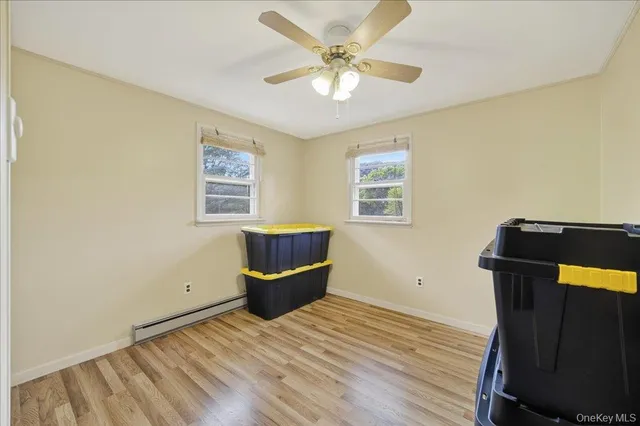 a workspace with furniture and window