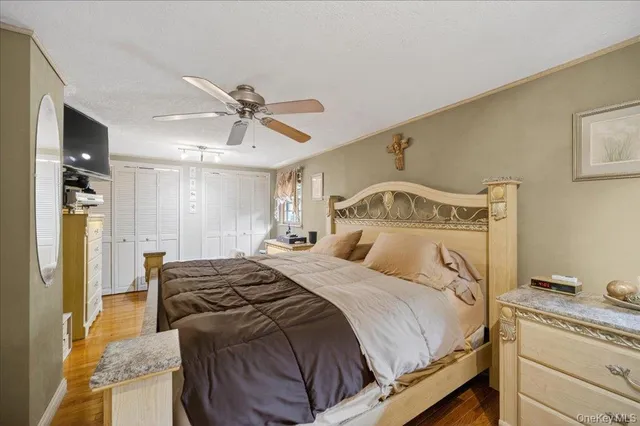 a view of room with window and wooden floor