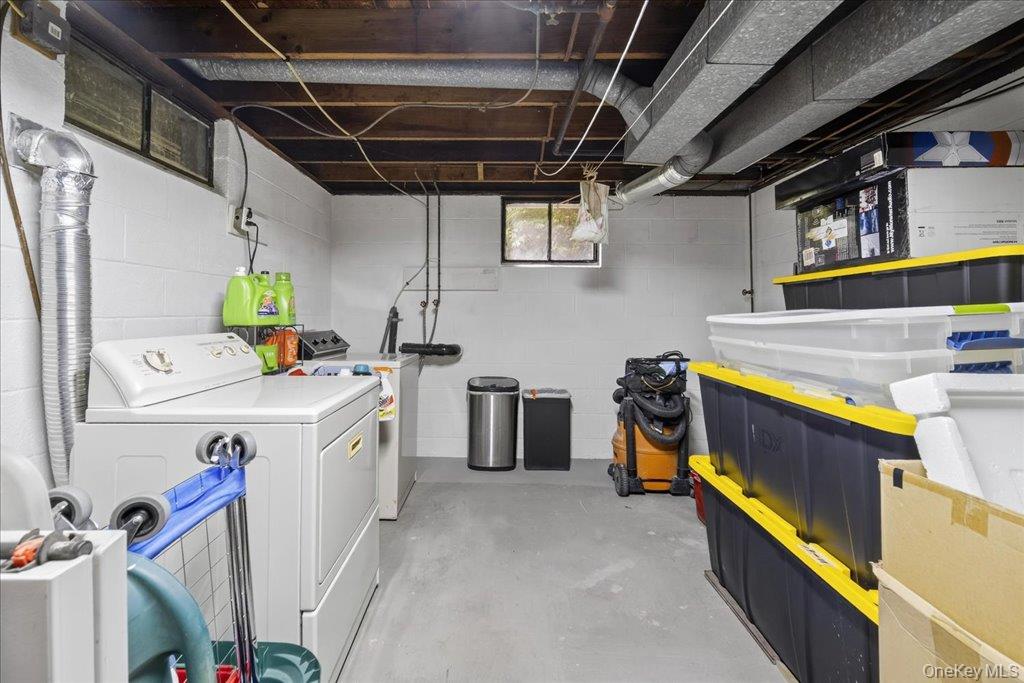 11 Merriewold Lane North Monroe, NY 10950 - Photo 31 of 48 Below grade area with washing machine and clothes dryer