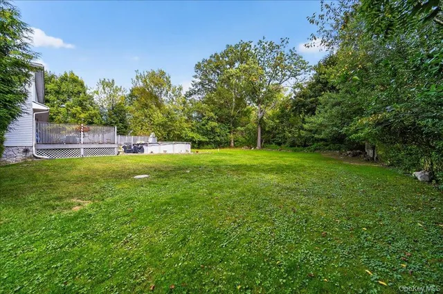 a view of a wooden deck and a patio