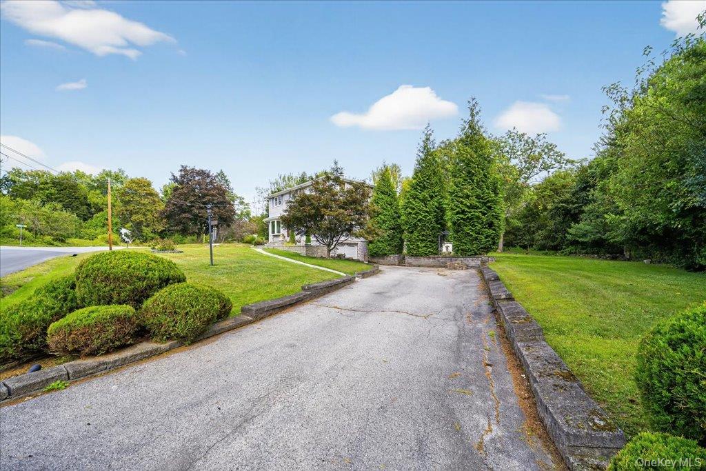 11 Merriewold Lane North Monroe, NY 10950 - Photo 5 of 48 View of asphalt driveway with view of wooded area