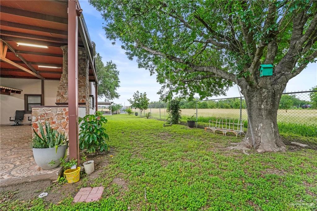 7411 East Texas Road Edinburg, TX 78542 - Photo 18 of 20 a view of backyard with tree