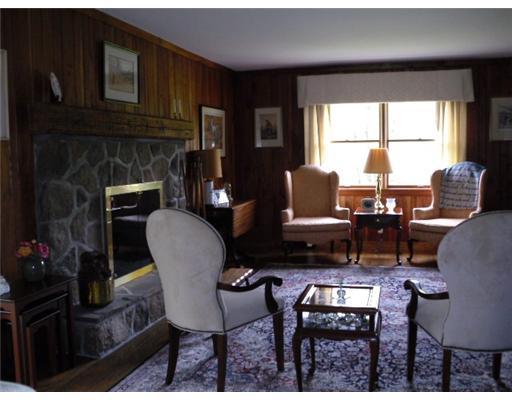188 Two Mile Run Road Ligonier, PA 15658 - Photo 11 of 18 Living Room. Cherry wood panels, hardwood floors, natural stone wood burning fireplace and lovely picture window with custom window treatments all combine to make this room such a lovely spot for graceful entertaining