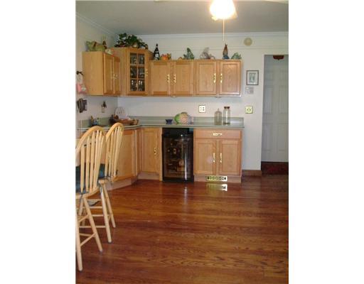 188 Two Mile Run Road Ligonier, PA 15658 - Photo 8 of 18 Kitchen. What a beauty. gleaming hardwoods, WOW-look at all the wonderful cabinetry- room for everything in style and a kitchen fireplace awaits you as well...