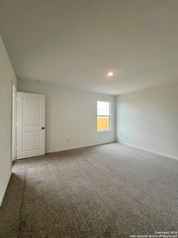 a bathroom with a double vanity sink and mirror
