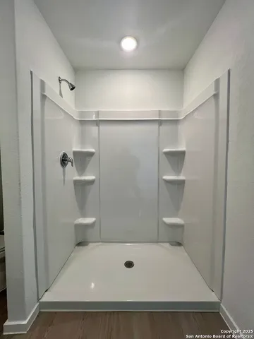 a view of a hallway with closet area