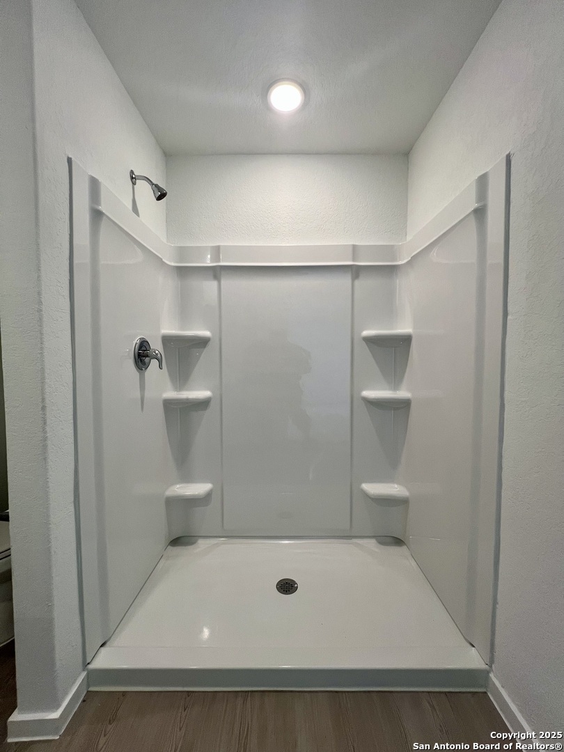 9178 Colonel Trail Seguin, TX 78155 - Photo 28 of 59 a bathroom with a shower