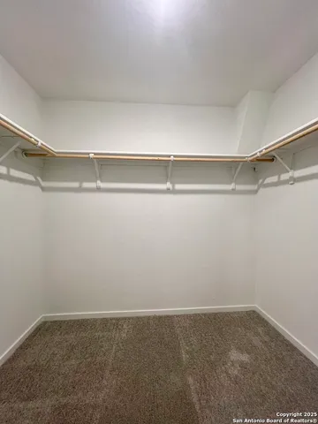 an empty room with an entryway