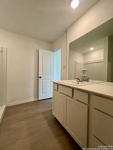 an empty room with closet area