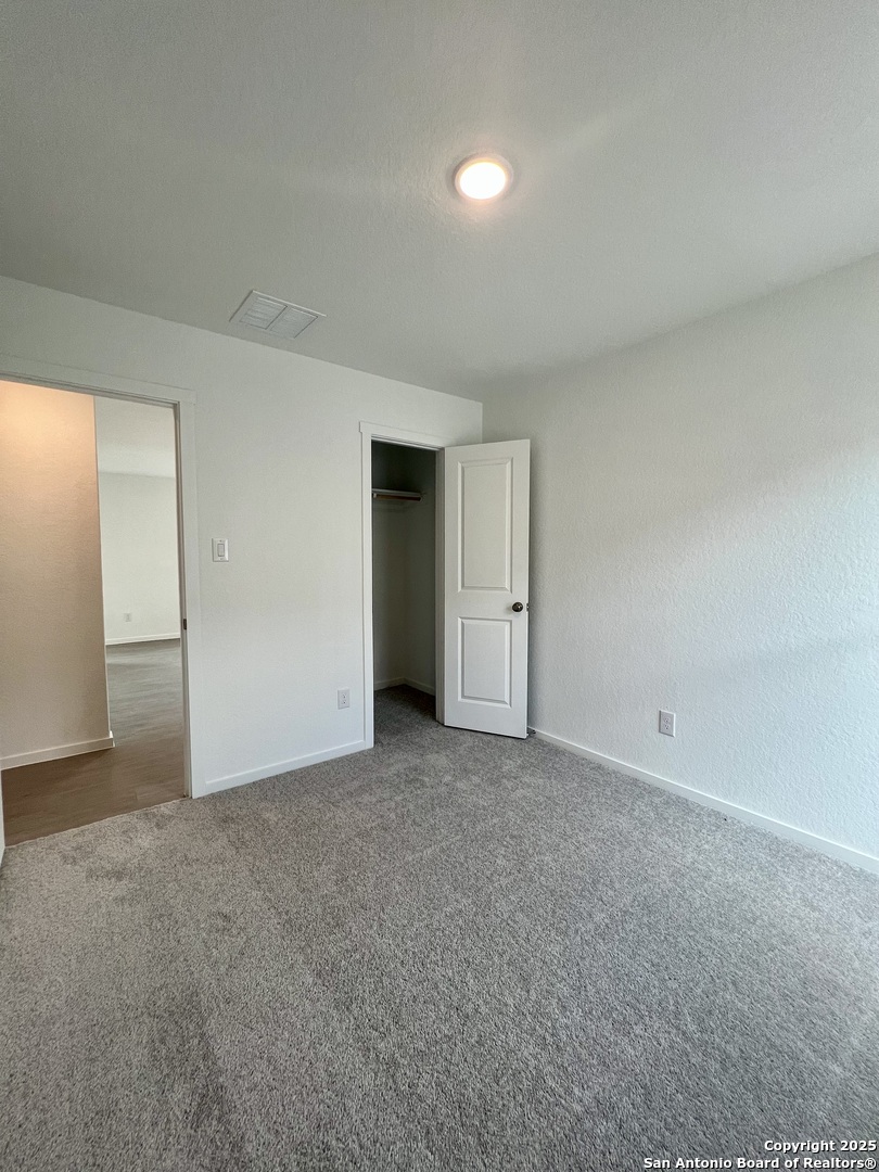 9178 Colonel Trail Seguin, TX 78155 - Photo 36 of 59 an empty room with an entryway