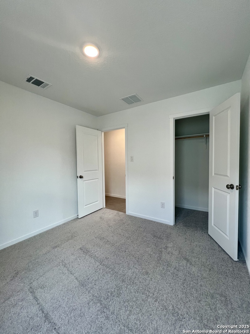 9178 Colonel Trail Seguin, TX 78155 - Photo 37 of 59 an empty room with closet area