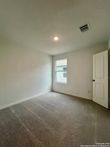 a bathroom with a sink toilet and a mirror
