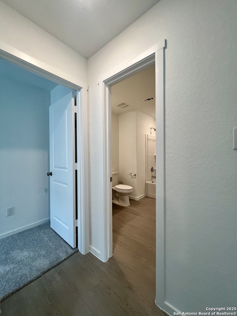 9178 Colonel Trail Seguin, TX 78155 - Photo 41 of 59 a view of a bedroom from a hallway