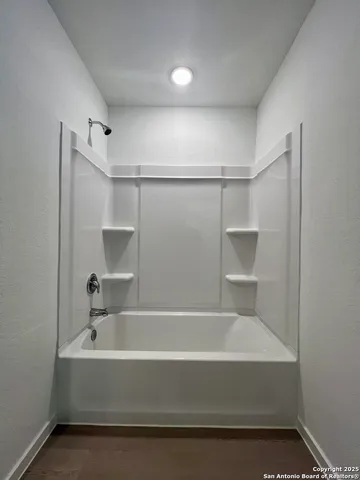 a sign that is sitting in front of a house